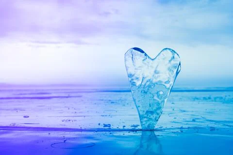 The ice shape of a heart. Stock Photos