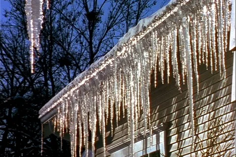 Ice Sickles drip on side of house Stock Footage 122114364