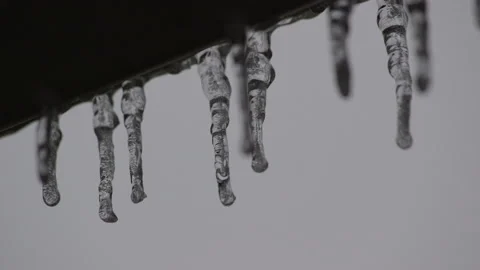 Ice sickles on house during winter Stock Footage 148594580