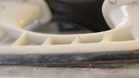 Ice skate blade close up as it spins on ice. Stock Footage 72536251