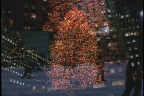 Ice skaters circle Rockefeller Center. Stock Footage