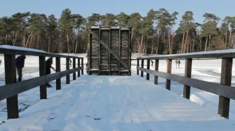 Ice Skaters Passing a Small Bridge Stock Footage 10773197