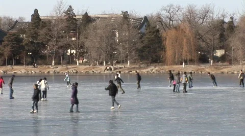 Ice skating on lake 2 Stock Footage 346173
