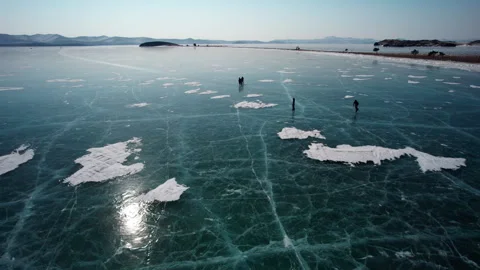 Ice skating on Lake Baikal Stock Footage 334556040