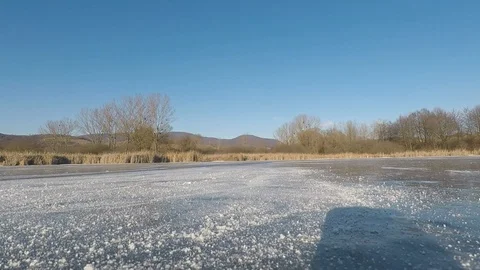 Ice skating on the lake Stock Footage 126169510