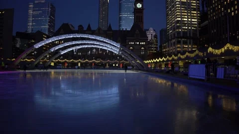 Ice skating in Nathan Phillips on winter night Stock Footage 146969110