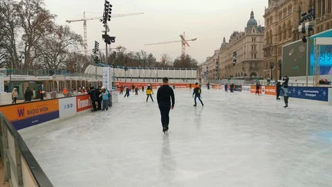Ice skating people at the Wiener Eistraum (ice rink).  Video stock 127640720
