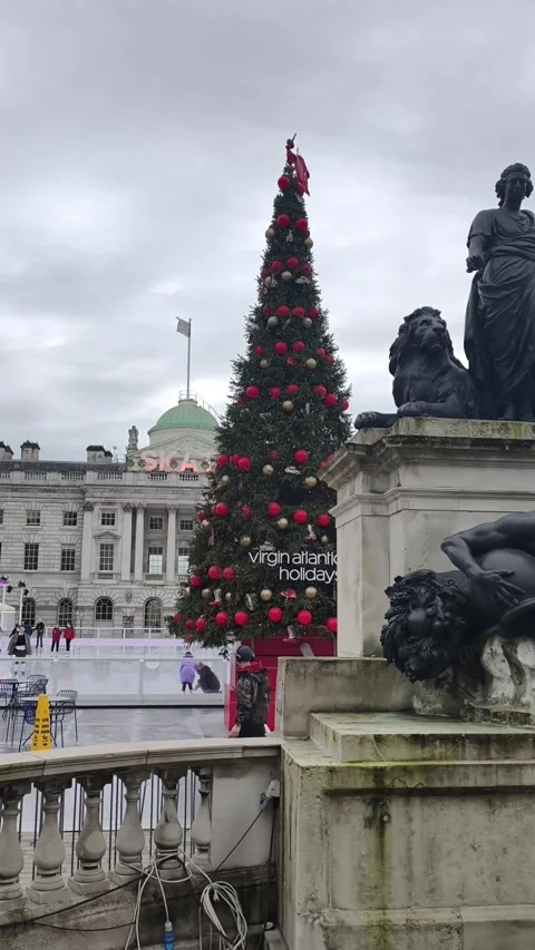 Ice skating rink set in the historic Somerset House in central London Stock Footage 323591109