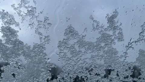 Ice/ snow crystals on window winter and snowing Stock Footage 235526608