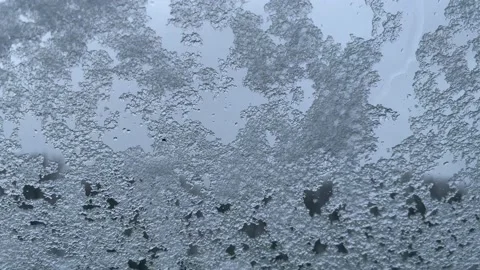 Ice/ snow crystals on window winter Stock Footage 235526612