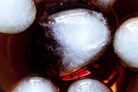Ice in soda background Stock Photos