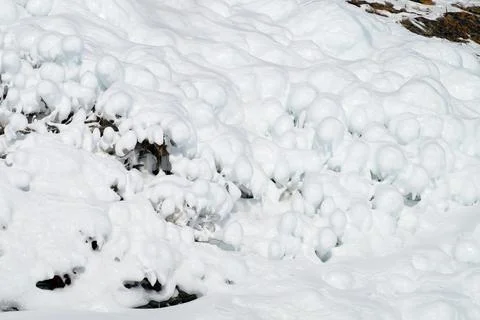 Ice splashes on the Mare's Head rock Lake Baikal Stock Photos