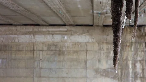 Ice stalactites under the bridge Stock Footage 107770849