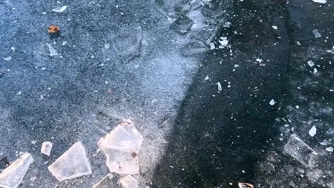 The ice surface of a frozen pond in winter. Video stock 302755784