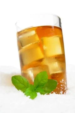 Ice tea with ice cubes,mint on ice on white background Stock Photos