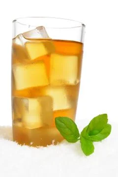 Ice tea with ice cubes,mint on ice on white background Stock Photos