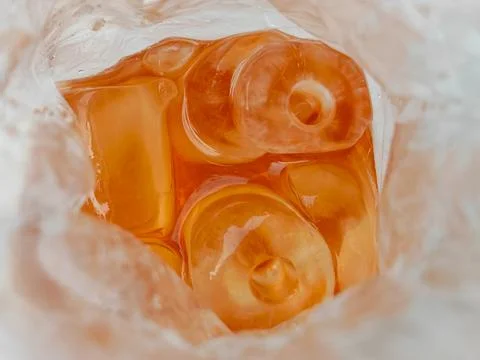 Ice tea in a plastic bag, defocus top view background Stock-Fotos