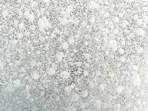 Ice texture background close up. Textured cold frosty surface of ice block wi Stock Photos