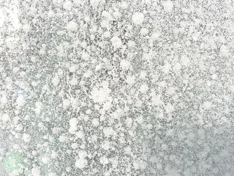 Ice texture background close up. Textured cold frosty surface of ice block wi Stock Photos