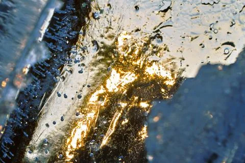 Ice texture backlit by the setting sun outdoors Foto stock