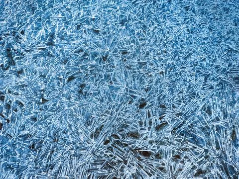 Ice texture. Blue winter background with water frozen by the cold. Natural ab Stock Photos