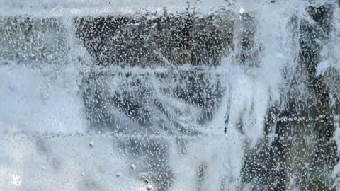Ice texture with cracks and air bubbles. Vídeo Stock 334578322