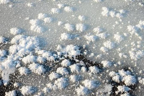 Ice texture with small snowflakes Stock Photos