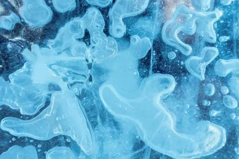 Ice tracery. The texture of ice structure. Christmas abstract background. Stock Photos