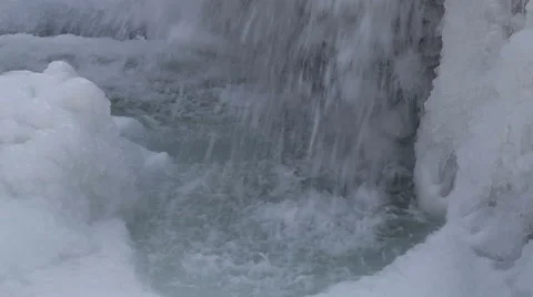 Ice waterfall in the rocks with lots of ice, movement of the camera Stock Footage 46207271