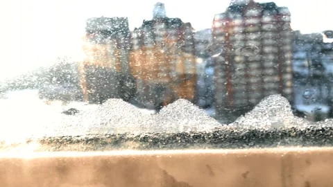 Ice on the window on a sunny day Stock Footage 147717159