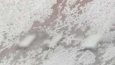 Ice on a window at sunrise, background Stock Footage 228853881