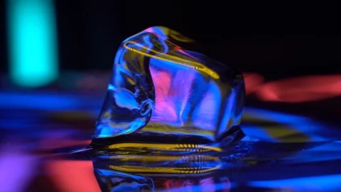 Ice with yellow neon light reflection Stock Footage 106828965