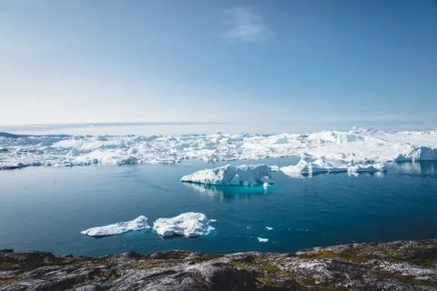 Iceberg and ice from glacier in arctic nature landscape in Ilulissat,Greenland Stock Photos