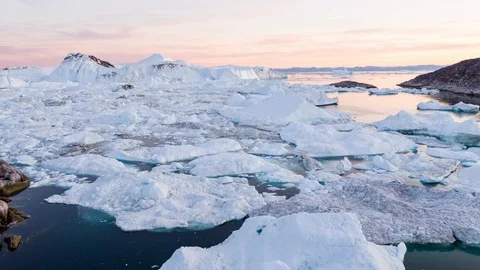 Iceberg and ice from glacier in dramatic arctic nature landscape on Greenland Stock Footage 114160144