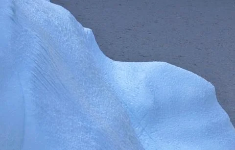 Iceberg closeup with interesting wave structure, Antarctica Stock Photos