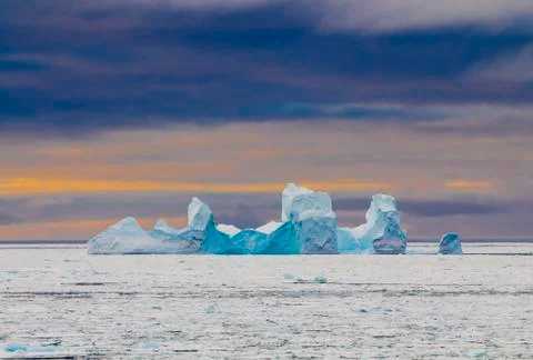 Iceberg during sunset Stock Photos
