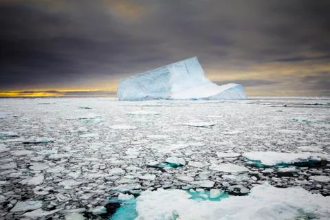 Iceberg during sunset Stock Photos