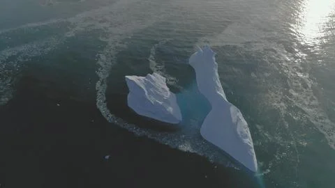 Iceberg float open ocean water drone aerial view Stock Photos