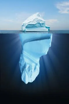 Iceberg floating in the ocean, both the tip and the submerged parts are visib Stock Photos