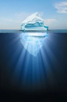 Iceberg floating in the ocean, both the tip and the submerged parts are visib Stock Photos