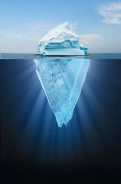 Iceberg floating in the ocean, both the tip and the submerged parts are visib Stock Photos