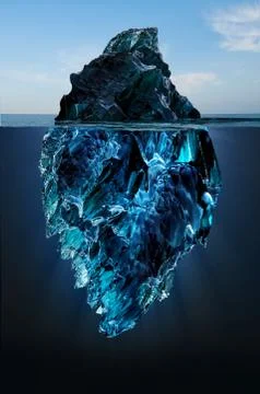 Iceberg floating in the ocean, both the tip and the submerged parts are visib Stock Photos