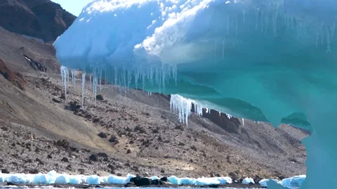 Iceberg icicles close-up passing by Antarctica, 4K Stock Footage 332372784