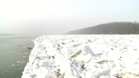 Iceberg, large amount of ice on river bank Stock Footage 11165525