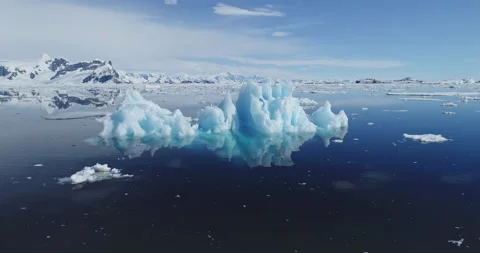 Iceberg ocean reflection aerial. Environment preserve at climate change concept Stock Footage 148356145