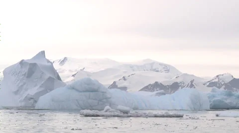 Iceberg rolling over, Antarctica Stock Footage