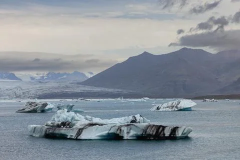 Iceberg swinging back and forth after breaking off. Stock Photos
