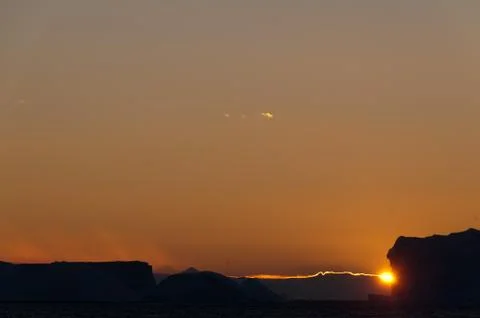 Icebergs in the evening light Stock Photos