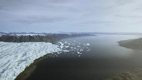 Icebergs float on glacier lagoon Stock Illustration