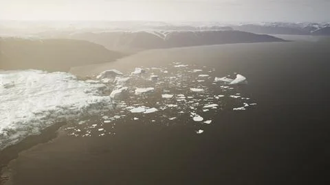 Icebergs float on glacier lagoon Stock Illustration